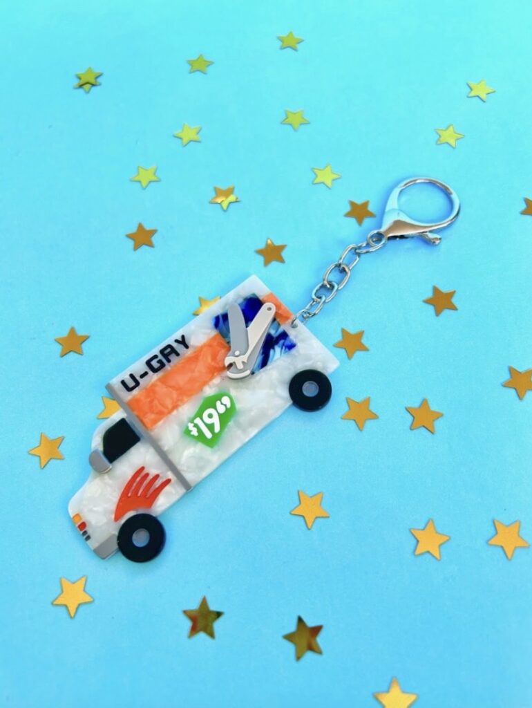 A U-Gay keychain from Peach Fuzz